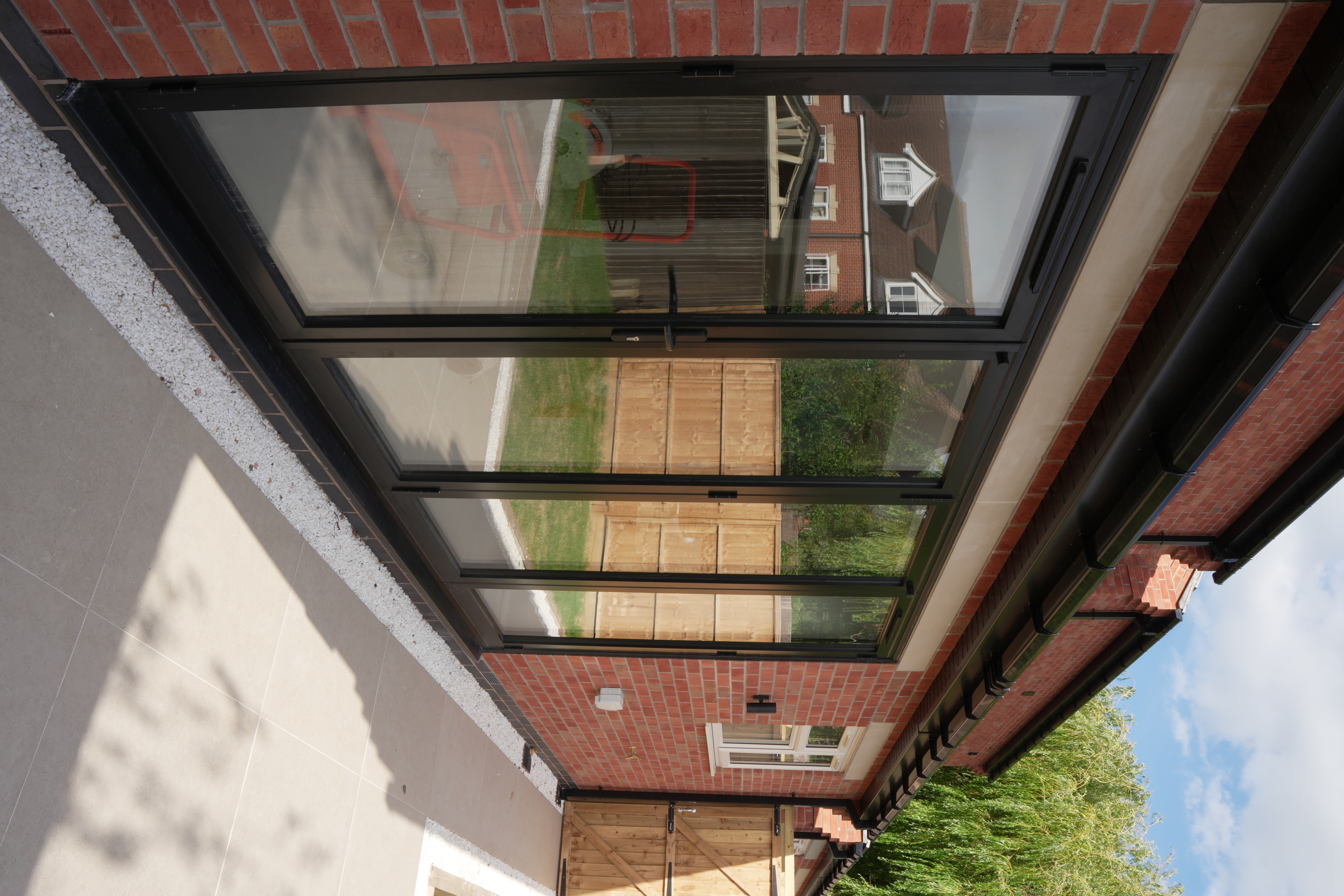 Aluminium bi-fold doors opening to garden